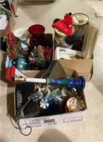 Three boxes - mostly Christmas items. First box