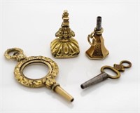 A group of fob watch seals and keys