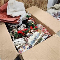 Unwrapped box of Christmas Decorations