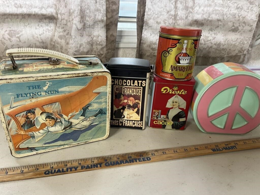 Vintage tin cans and lunchbox