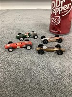 4 Miniature Race Cars