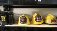 Shelf lot of LAFD helmets, masks, Oxygen