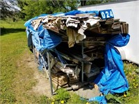 lumber wrapped up next to trailer