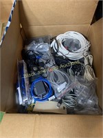 Box of assorted cables, cords, connectors