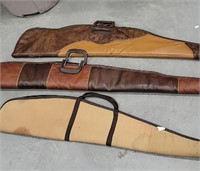 3 soft gun cases 2 leather, 1 cloth