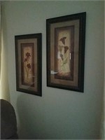 2 floral prints in wood frames