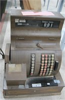 metal cash register with wood grain finish