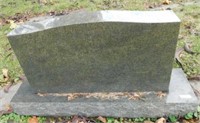 Granite headstone on base: