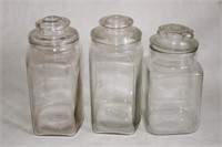 Three Clear Canisters