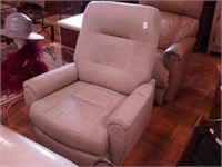 Upholstered gray rocker/recliner missing