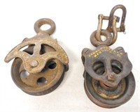 lot of 2 steel pulleys possibly for hay carrier