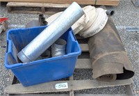 Tar paper, blue tote with ducting, fire hoses