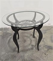 WROUGHT IRON BASED GLASS TOPPED TABLE W SUN MOTIF