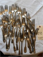 silver forks, some appear sterling