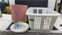Rubbermaid laundry basket, plastic bin, and paper