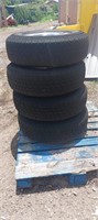 starfire 235/85/16 set tires and rims