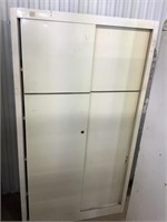 Sliding door metal cabinet 66” tall x 36” wide x