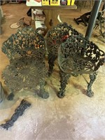 CAST IRON GARDEN CHAIRS (3) AND SIDE TABLE (BROKEE