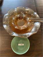 Orange glassware/silver spoons/jadeite dish