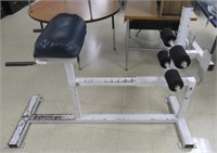 Sit-up exercise machine.