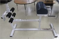Sit-up exercise machine.