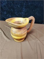 Hand crafted wooden pitcher. Stamped Leroy Smith.