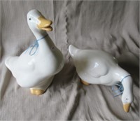 Pair of pottery ducks. Note: (1) Has repair to