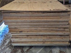 STACK OF ASSORTED PLYWOOD SHOWS DAMAGE