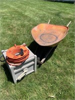 wheelbarrow, extension cord, hose reel
