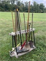 Assorted garden tools with rack