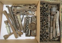 Antique sockets, wrenches and tooling.