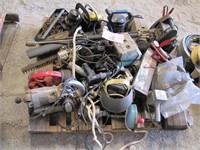 Pallet of tools: chainsaw, blower, bench grinder,