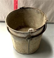 Galvanized steel pails some holes