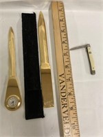 2 Brass letter openers and mother of pearl handle