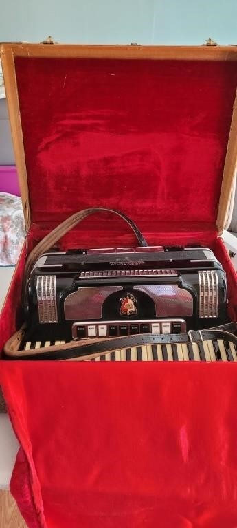 Vintage Harmonian Accordian with case