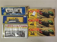 (6) Various HO Scale Train Cars In Boxes