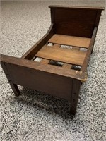 ANTIQUE WOODEN DOLL BED