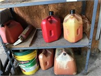 Metal shelf and 5 gas cans