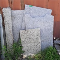 5 pieces of slab of granite. Largest Measures