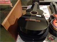 Acoustic guitar w/case and book