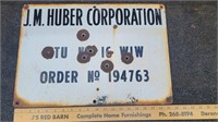J.M. Huber Corporation Porcelain sign with bullet