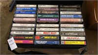 Three cassette cases, one with country and