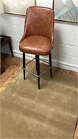 4x6 neutral color rug and brown cover swivel bar