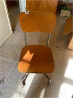 Vintage wooden rolling chair