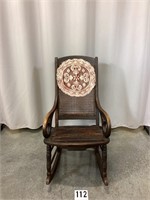 Antique Woven Back Rocking Chair