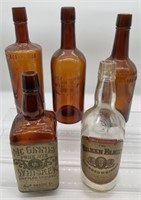 5 Whiskey bottles