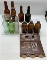 assorted beer, soda and bitters bottles