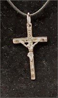 Crucifix pendent necklace.