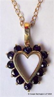 A Sapphire Heart Shaped Pendant