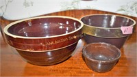 3 brown stoneware mixing bowls. Dimensions of larg